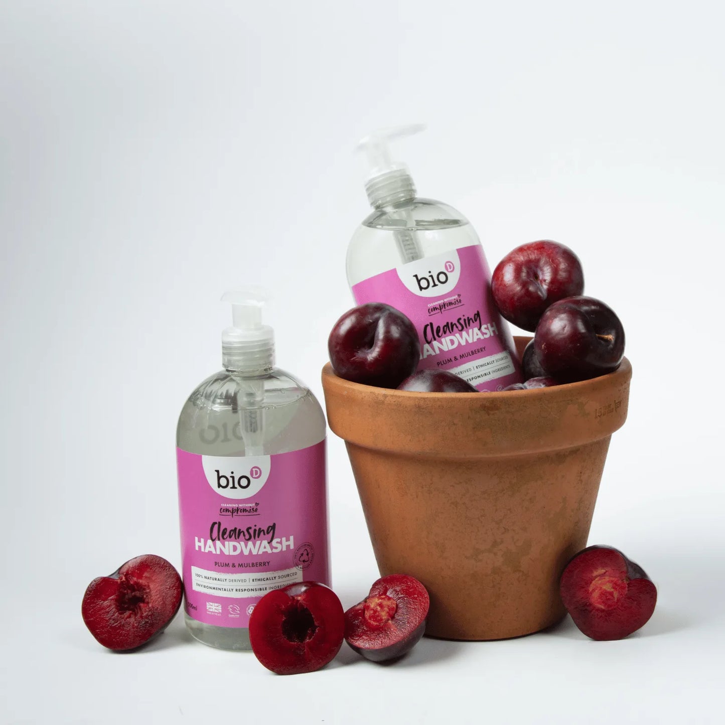Bio-D Hand Wash Plum & Mulberry 500ml Front lifestyle picture with plums.