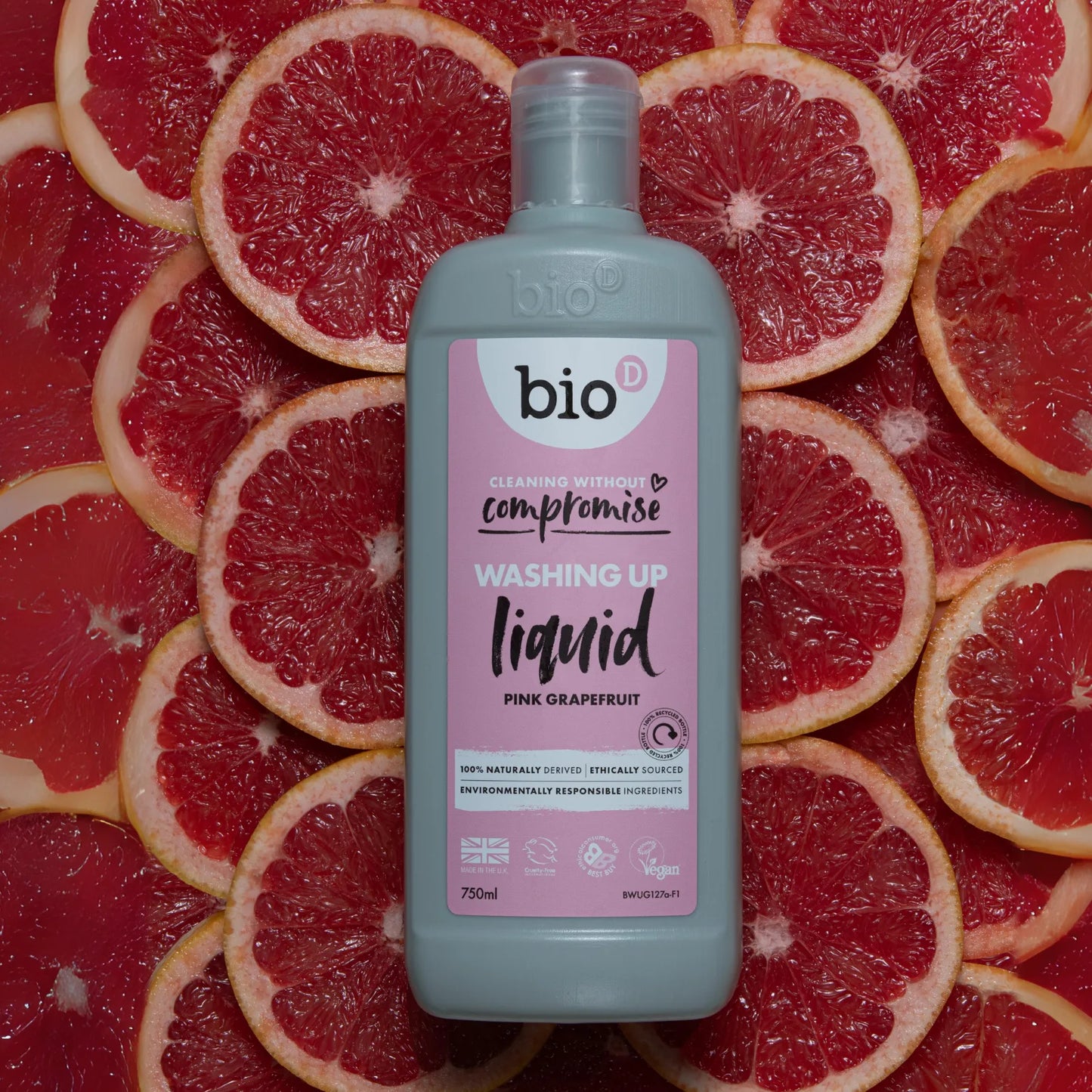 Bio-D Washing-Up Liquid Grapefruit 750ml Front label bottle on sliced grapefruits background.