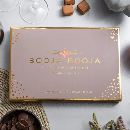 Booja Booja Fine De Champagne Sixteen Truffles packaging featuring organic and dairy-free chocolate delights.