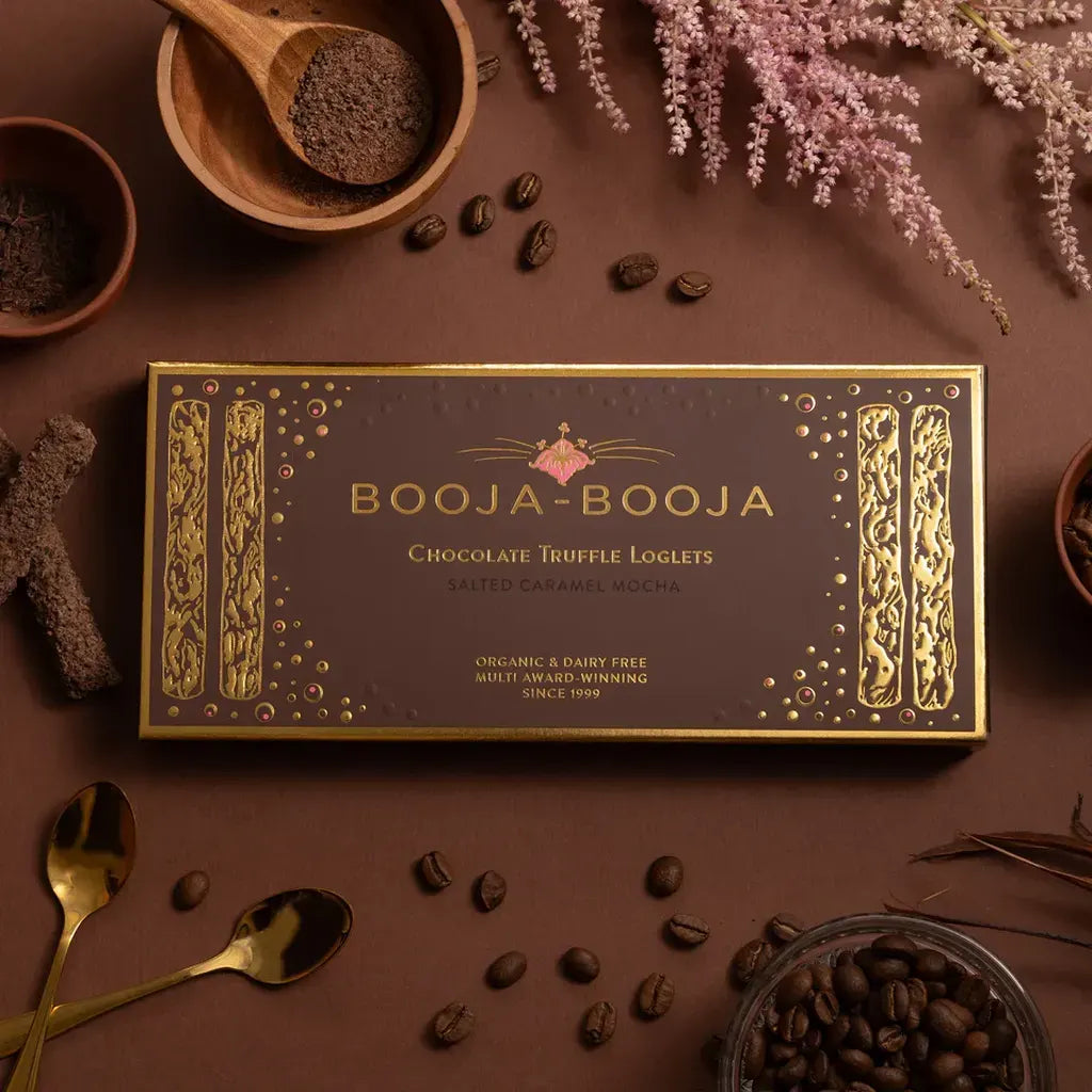 Booja Booja Loglets Salted Caramel Mocha chocolate truffle loglets packaging with cocoa and coffee.