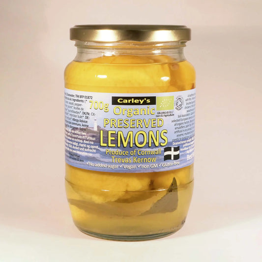 Carley's Preserved Lemons Organic jar featuring Sicilian lemons brined with sea salt, bay leaves, and peppercorns.