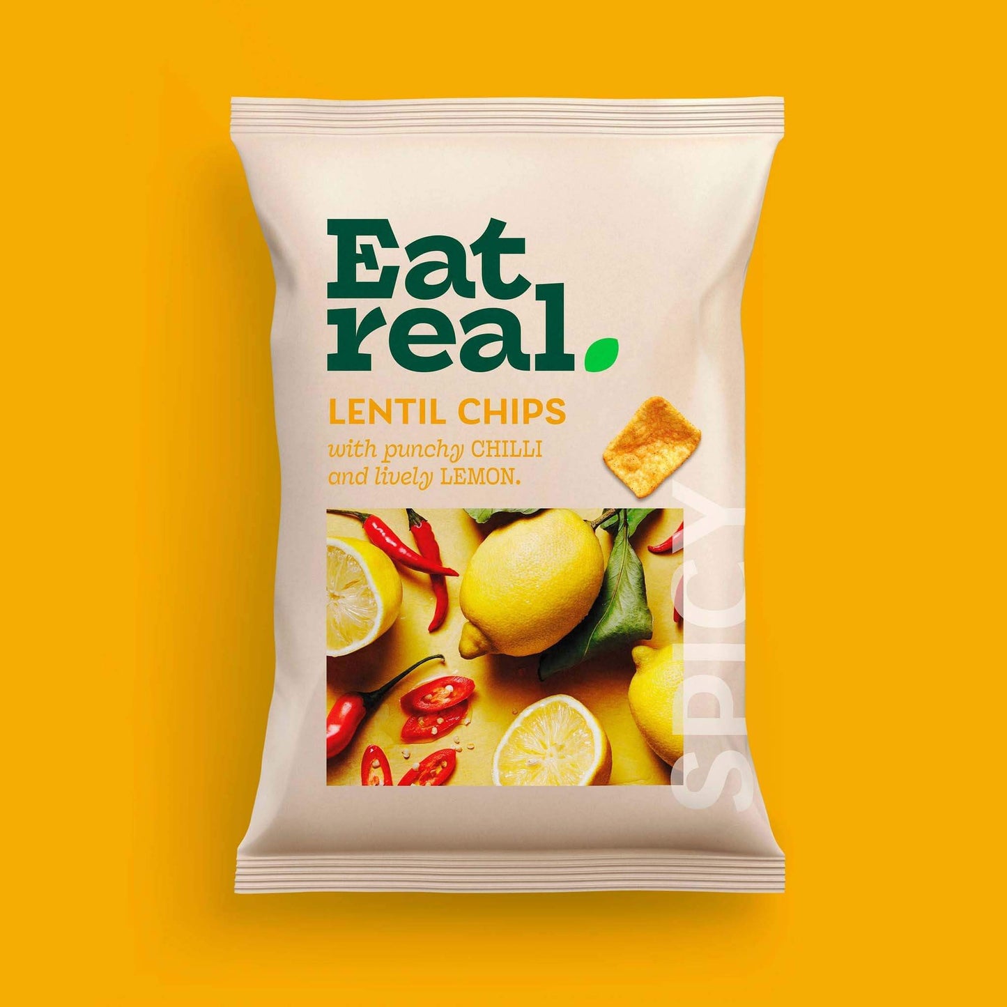 Pack of Eat Real 40g chilli & leamon flavour lentil chips on a yellow background