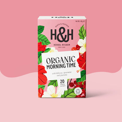 Heath & Heather Morning Time Teabags Organic package with vibrant floral design on a pink background.