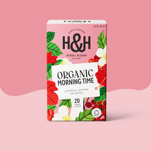 Heath & Heather Morning Time Teabags Organic package with vibrant floral design on a pink background.