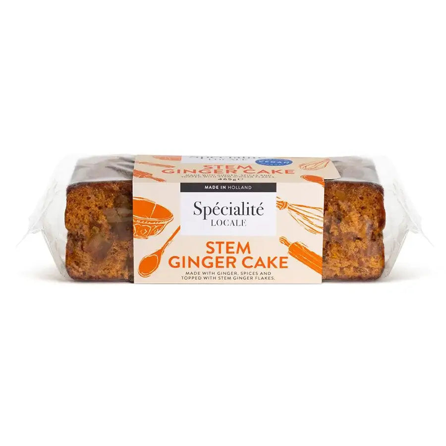 A packaged loaf of Spécialité Locale Stem Ginger Cake, wrapped in clear plastic with a cream-colored paper label featuring orange illustrations and black text, set against a plain white background.