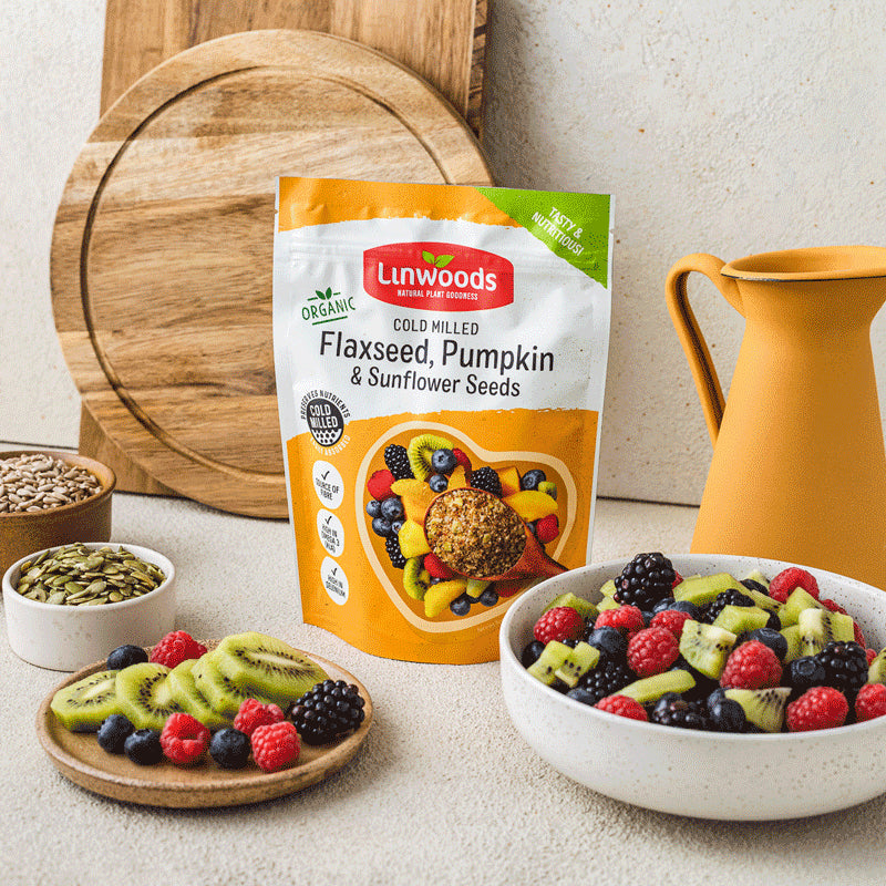Linwoods Flaxseed, Pumpkin & Sunflower Seeds serving suggestion, spoon of seeds