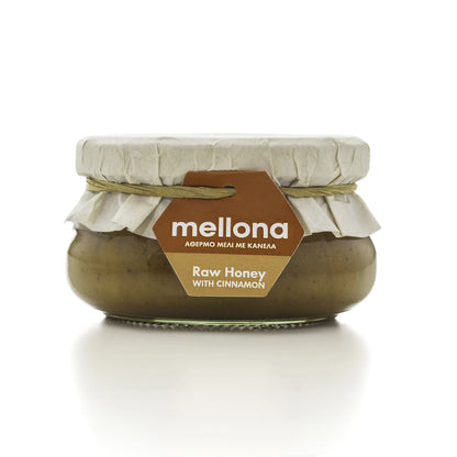 Mellona Raw Honey with Cinnamon in a glass jar, featuring a tag highlighting its pure ingredients from Cyprus.