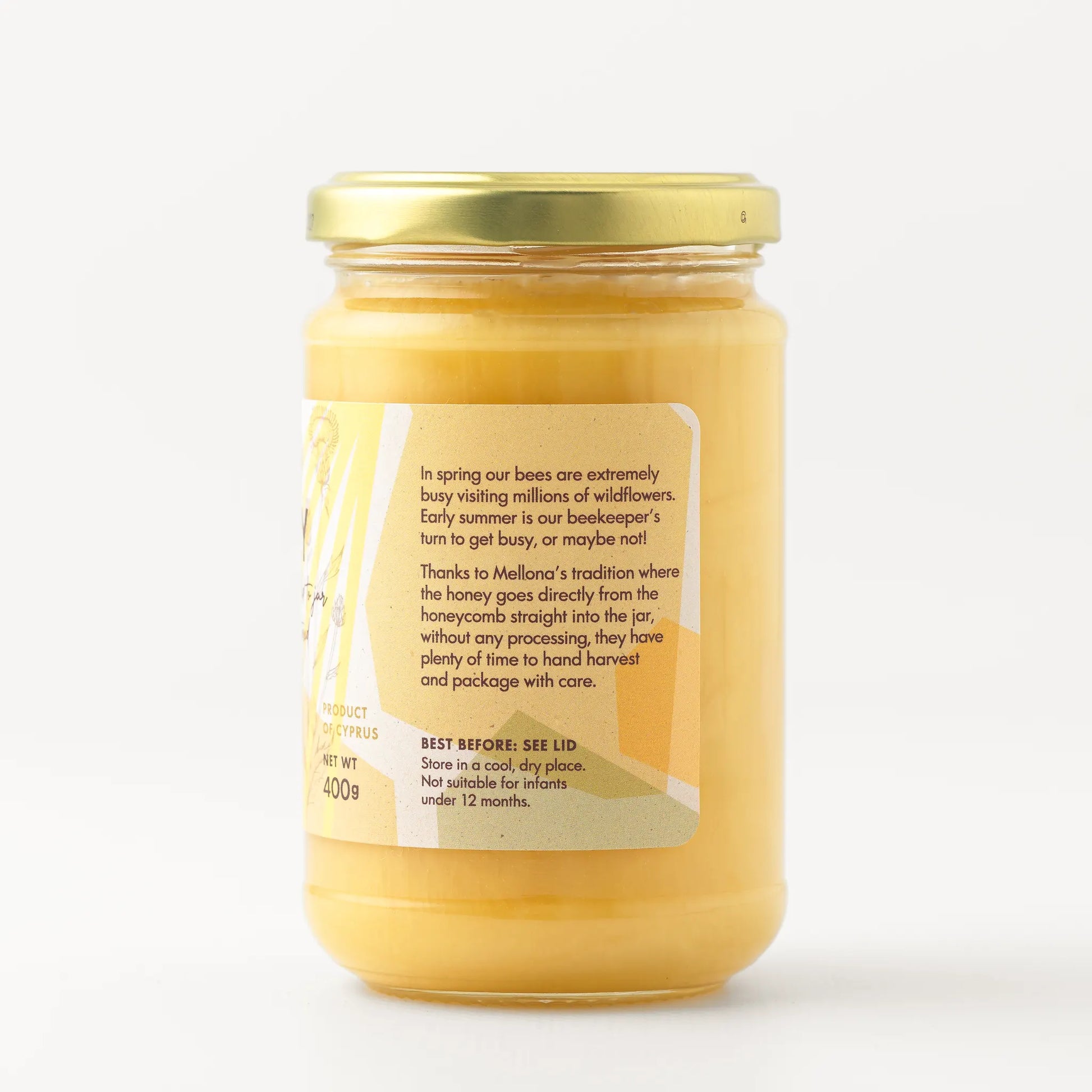 Mellona Raw Honey 400g jar showcasing pure flower honey with details on its natural sourcing.