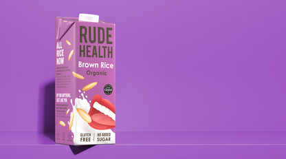 Rude Health Organic Brown Rice Drink poured, lifestyle shot