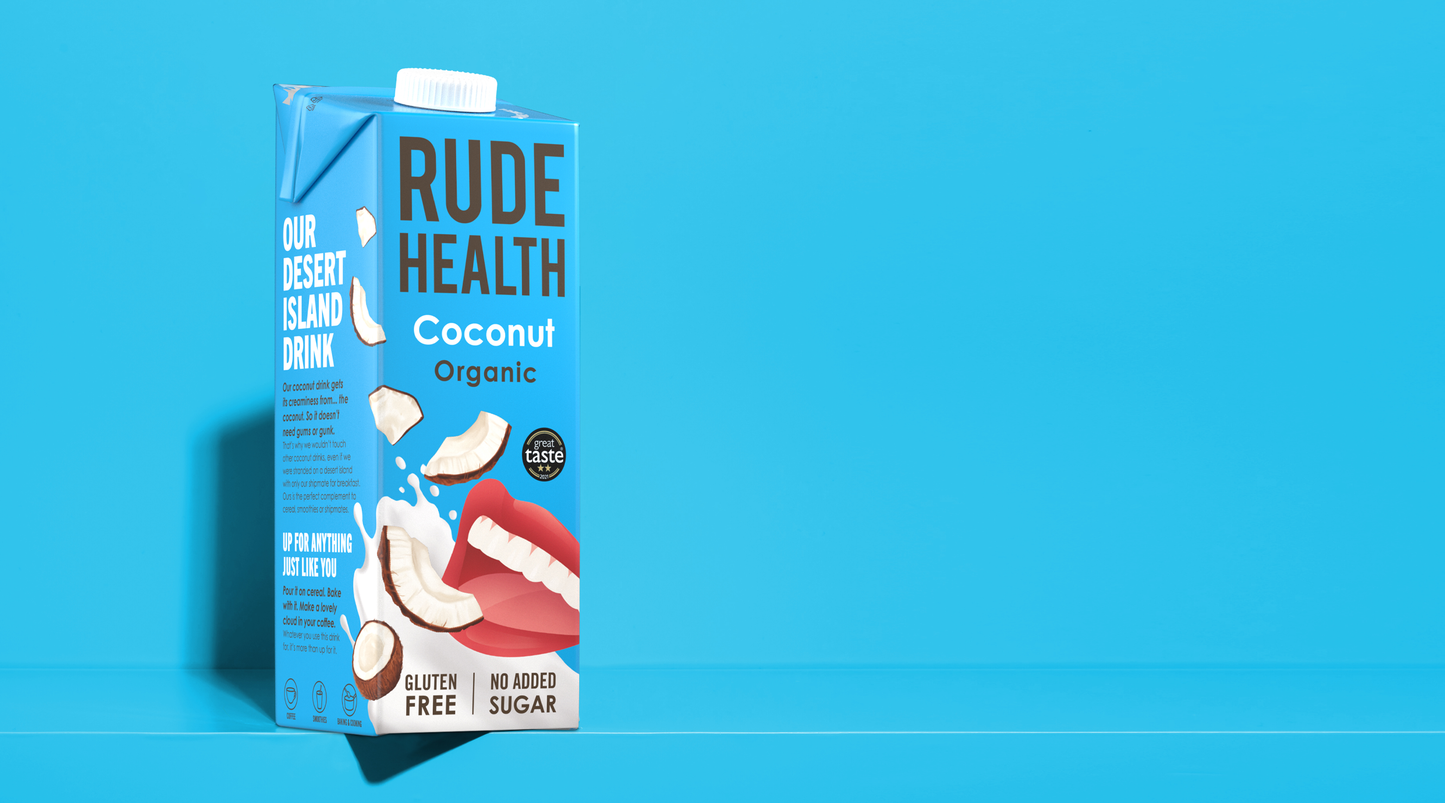 Rude Health Organic Coconut Drink poured, lifestyle shot