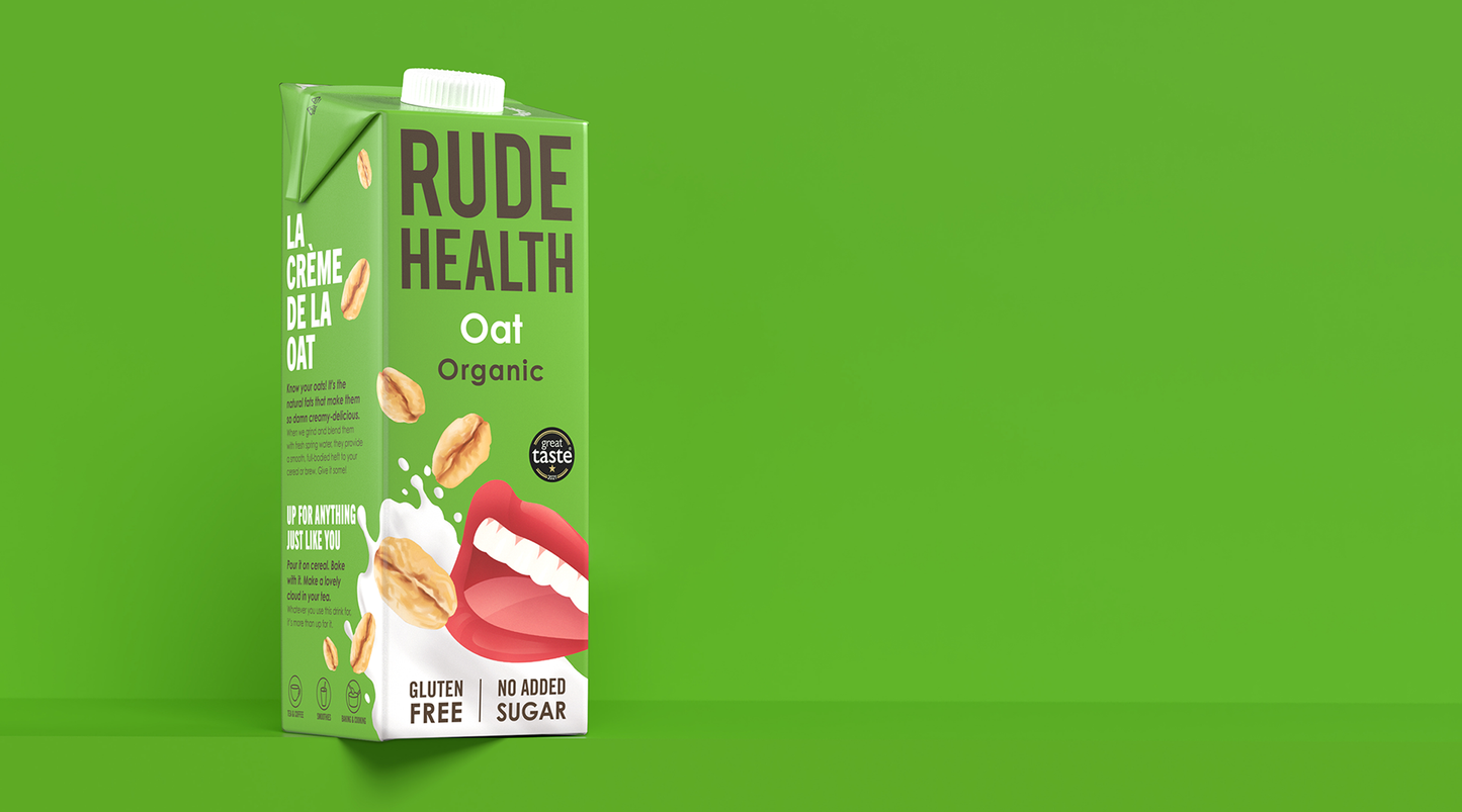 Rude Health Organic Oat Drink poured, lifestyle shot